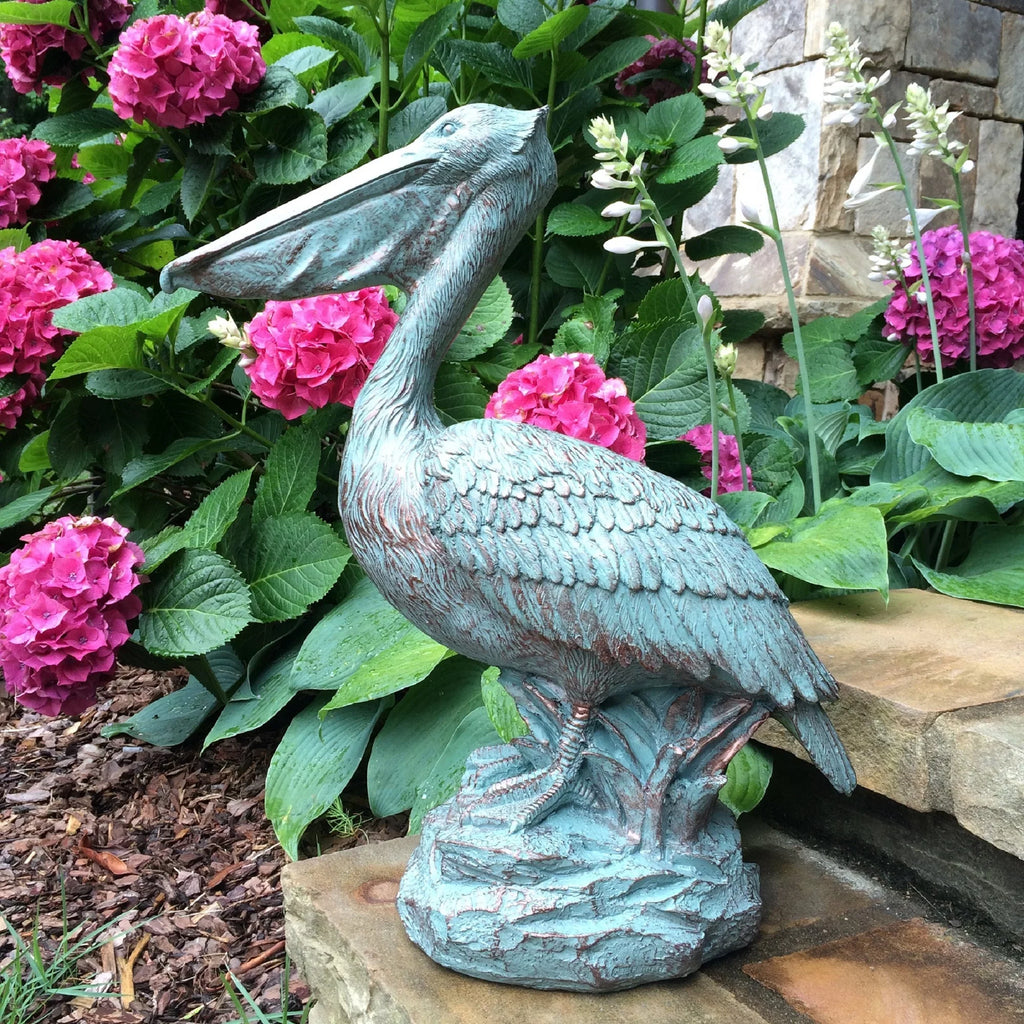 Homestyles 20 in. Bronze Patina Pelican on Coastal Rock Nautical Beach Statue