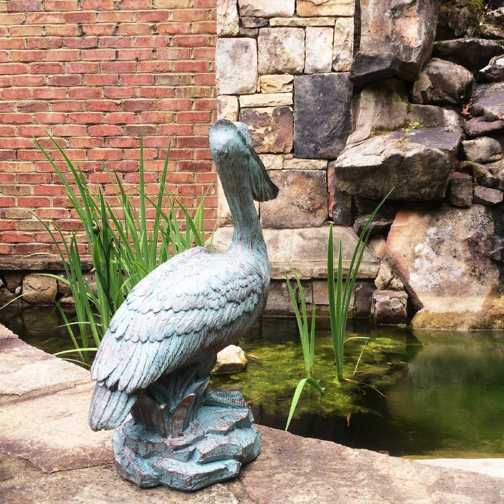 Homestyles 20 in. Bronze Patina Pelican on Coastal Rock Nautical Beach Statue