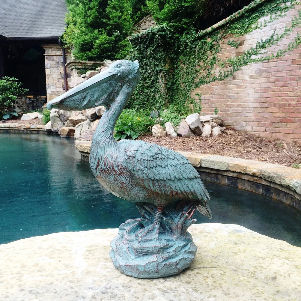 Homestyles 20 in. Bronze Patina Pelican on Coastal Rock Nautical Beach Statue